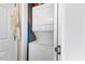 Convenient laundry area with stacked washer and dryer units at 800 Savannah Ridge Rd # 109, Holly Springs, NC 27540