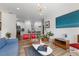 Bright living room featuring modern decor and a seamless flow into the kitchen area at 800 Savannah Ridge Rd # 109, Holly Springs, NC 27540