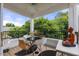 Outdoor patio with seating area, perfect for relaxing and enjoying the views at 800 Savannah Ridge Rd # 109, Holly Springs, NC 27540