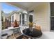 Outdoor patio with seating area, perfect for relaxing and enjoying the views at 800 Savannah Ridge Rd # 109, Holly Springs, NC 27540
