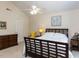 Cozy bedroom with vaulted ceiling, a ceiling fan, and natural light at 8001 Strawberry Meadows St, Raleigh, NC 27613