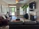 Cozy living room with hardwood floors, fireplace, and comfortable seating; an inviting and relaxing space at 8001 Strawberry Meadows St, Raleigh, NC 27613
