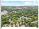 A captivating aerial view showcases the property in its lush green surroundings at 805 N Columbia St, Chapel Hill, NC 27516