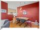 Open-concept dining area featuring hardwood floors and seamlessly connects to the kitchen at 805 N Columbia St, Chapel Hill, NC 27516