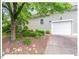 The exterior of the home includes an attached garage and mature landscaping at 805 N Columbia St, Chapel Hill, NC 27516