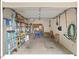 Spacious garage providing ample storage with shelving and various organizational tools at 805 N Columbia St, Chapel Hill, NC 27516