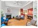Living room with high ceilings, hardwood floors, a fireplace and lots of natural light at 805 N Columbia St, Chapel Hill, NC 27516