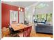 Open concept living space showcases hardwood floors, large windows, and a welcoming atmosphere at 805 N Columbia St, Chapel Hill, NC 27516
