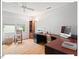 Bright home office with wood floors, a large desk, and lots of natural light from large windows at 805 N Columbia St, Chapel Hill, NC 27516