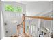 Staircase featuring hardwood steps and rails at 805 N Columbia St, Chapel Hill, NC 27516