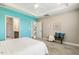 Bedroom with carpet, access to a bathroom and walk-in closet, and a sitting bench at 8217 White Star Dr, Fuquay Varina, NC 27526