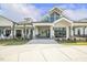 Welcoming community clubhouse entrance with classic architectural design at 8217 White Star Dr, Fuquay Varina, NC 27526