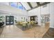 Inviting seating area in the lobby with tables and comfortable chairs, creating a welcoming and relaxing space for residents at 8217 White Star Dr, Fuquay Varina, NC 27526