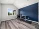 Bright office space with large window, modern desk, and stylish chair for a productive work environment at 8828 Deerland Grove Dr, Raleigh, NC 27615