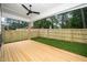 Covered back porch and newly fenced backyard at 905 Deboy St, Raleigh, NC 27606