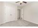 A bedroom with plush carpeting and ample closet space at 9709 Batesville Dr, Raleigh, NC 27617