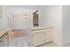 An open floor plan showcasing the stone fireplace and light-filled rooms at 9709 Batesville Dr, Raleigh, NC 27617