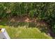 Aerial view featuring trees and a green backyard, offering privacy and space at 9728 Batesville Dr, Raleigh, NC 27617