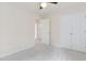Inviting bedroom with a ceiling fan, closet, and neutral carpet at 9728 Batesville Dr, Raleigh, NC 27617
