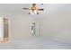 Bedroom featuring neutral carpet, a ceiling fan, and ensuite bathroom entrance at 9728 Batesville Dr, Raleigh, NC 27617