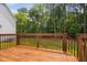 The wooden deck overlooks the backyard at 9728 Batesville Dr, Raleigh, NC 27617