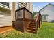 Close up of the deck with access stairs to the backyard at 9728 Batesville Dr, Raleigh, NC 27617