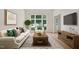 Bright living room with a large window, neutral walls, stylish decor and hardwood flooring at 9728 Batesville Dr, Raleigh, NC 27617
