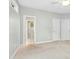 Spacious bedroom with carpeted floors, ceiling fan, and access to ensuite bathroom at 1003 Blackberry Ln, Durham, NC 27712