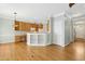 Spacious kitchen and living area with wood cabinets and lots of light at 1003 Blackberry Ln, Durham, NC 27712
