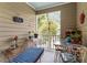Cozy screened back porch provides an inviting outdoor seating area at 1009 Iredell St # D, Durham, NC 27705