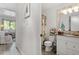 Bathroom featuring granite countertop, and shower with patterned curtain at 1009 Iredell St # D, Durham, NC 27705
