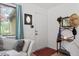 Inviting foyer with a stylish mirror and coat rack, creating a welcoming entryway at 1009 Iredell St # D, Durham, NC 27705