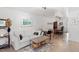 Bright living room with cozy sofas, coffee table and an inviting dining area at 1009 Iredell St # D, Durham, NC 27705