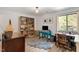 Cozy home office space with ample natural light and storage at 1009 Iredell St # D, Durham, NC 27705
