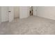 Spacious bedroom with light gray carpet and access to two closets at 1016 Kingston Grove Dr, Cary, NC 27519