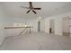 A large loft with neutral carpet provides a spacious, versatile living area at 1016 Kingston Grove Dr, Cary, NC 27519
