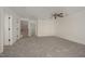 A large loft with neutral carpet provides a spacious, versatile living area at 1016 Kingston Grove Dr, Cary, NC 27519