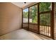 Screened porch with view of the fenced backyard at 1016 Kingston Grove Dr, Cary, NC 27519