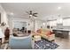Open layout with hardwood floors, fireplace, and a seamless transition to the kitchen and dining areas at 10310 Sablewood Dr # 115, Raleigh, NC 27617