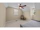 Bedroom offering bright natural light and featuring a chair and overhead fan at 1033 Mills St, Raleigh, NC 27608