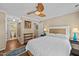 Comfortable bedroom with a ceiling fan and en-suite bathroom providing a relaxing retreat at 1033 Mills St, Raleigh, NC 27608