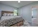 Cozy bedroom features soft colors, plush bedding, and a neutral color scheme at 104 S Tunstall St, Apex, NC 27502
