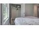 Neutral secondary bedroom showcasing wood floors and ample closet space at 104 S Tunstall St, Apex, NC 27502