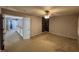 View of a bedroom with carpet floors, ceiling fan, and geometric accents at 10415 Neland, Raleigh, NC 27614