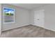 Bedroom featuring a double-door closet and large window with a view at 106 Flue Ct, Oxford, NC 27565