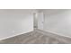 View of bedroom with neutral walls and carpets and adjoining doorway at 106 Flue Ct, Oxford, NC 27565