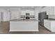 Spacious kitchen with granite countertops, stainless steel appliances, and a large island at 106 Flue Ct, Oxford, NC 27565