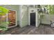 Exterior deck with a sliding door and view of the green backyard and outdoor area at 11 Willow Bridge Dr, Durham, NC 27707