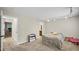 Spacious bedroom with neutral walls, soft carpet, and ensuite access to the bathroom at 11 Willow Bridge Dr, Durham, NC 27707