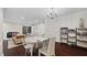 Spacious living room with fireplace, dining area and wood floors at 11 Willow Bridge Dr, Durham, NC 27707